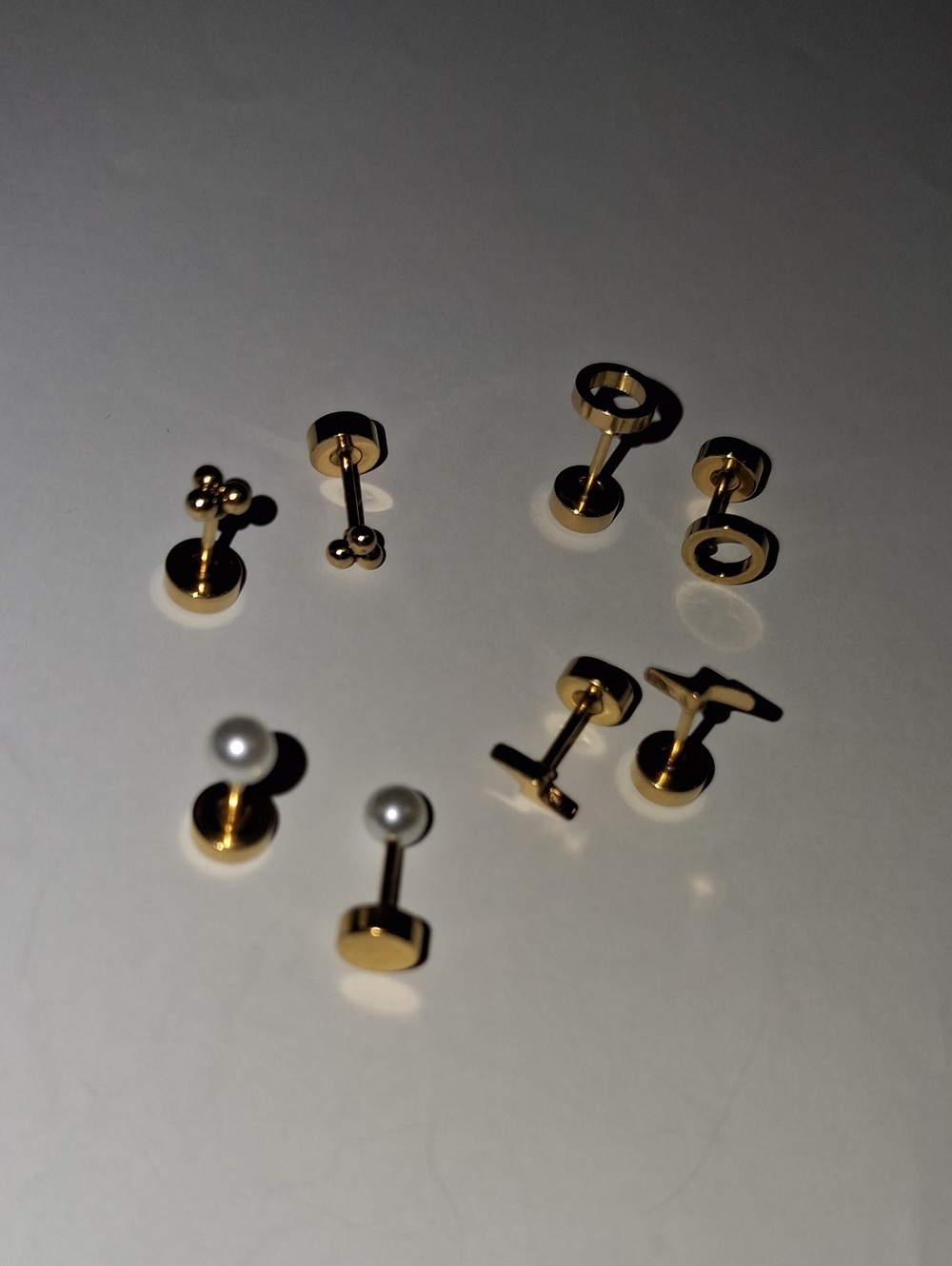 Set of Gold Tone Flat Back Earrings